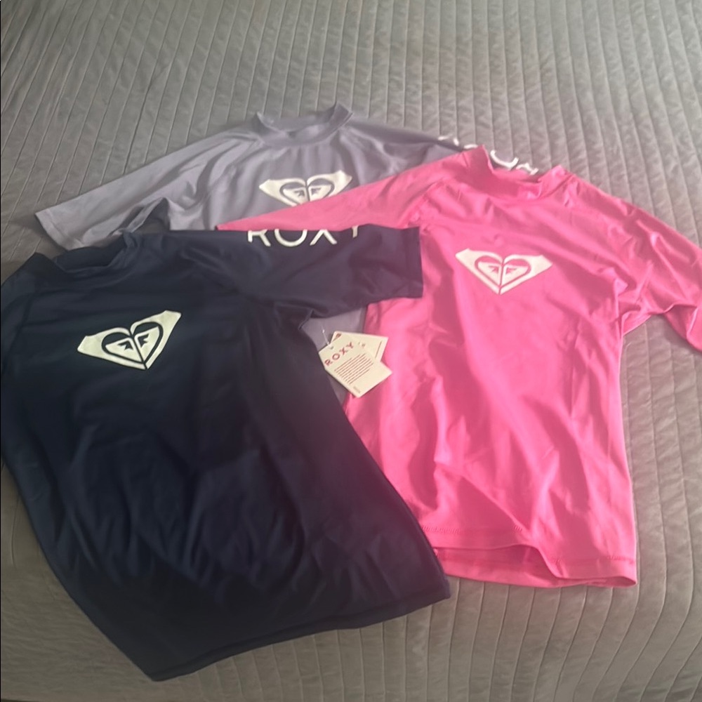 Roxy Rash Guard Trio in Pink, Black, and Gray